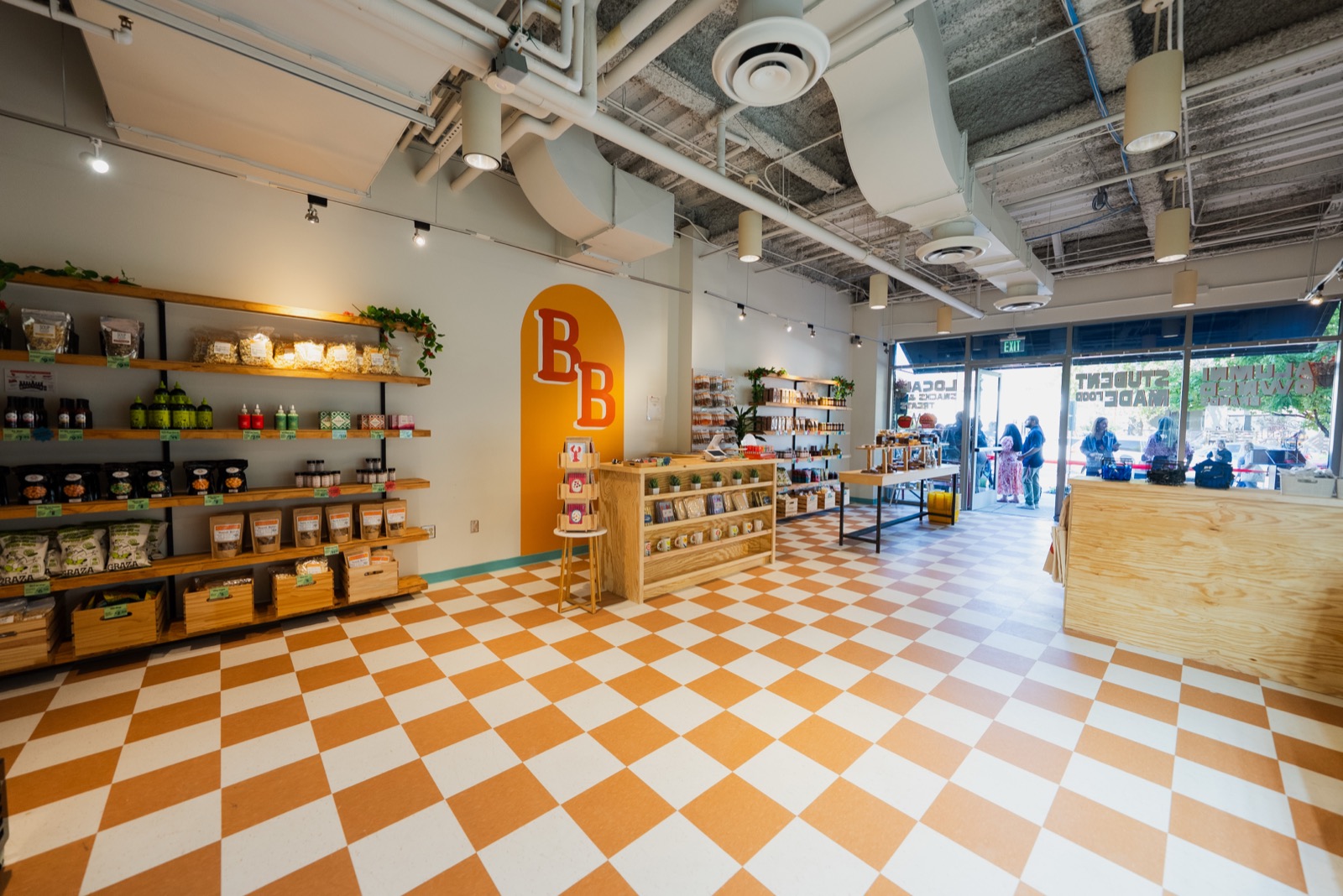 Inside Bruin Bodega, with its orange checkerboard floor