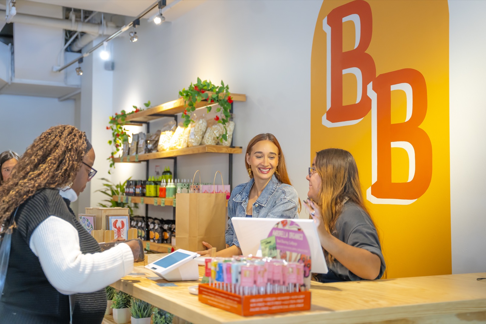 Students at the Bruin Bodega counter