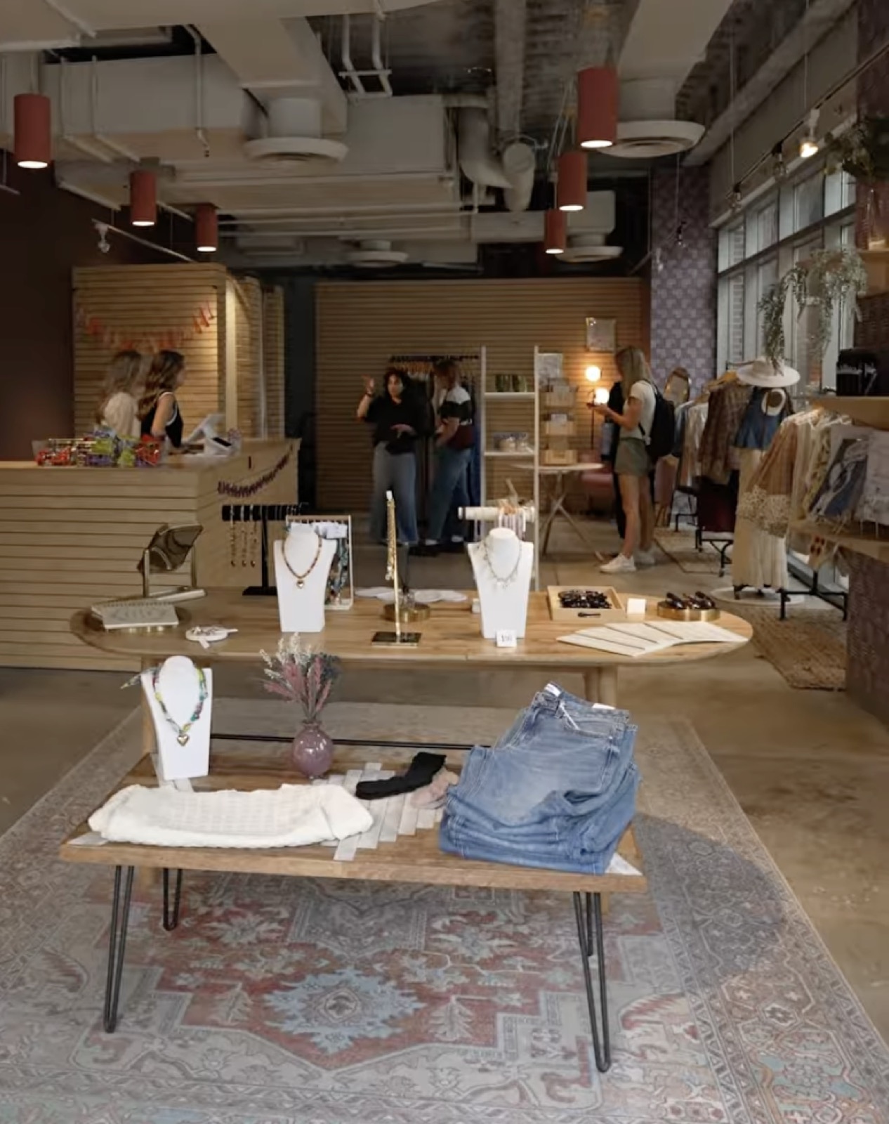 Inside House Of, with jewellery displays and clothing racks