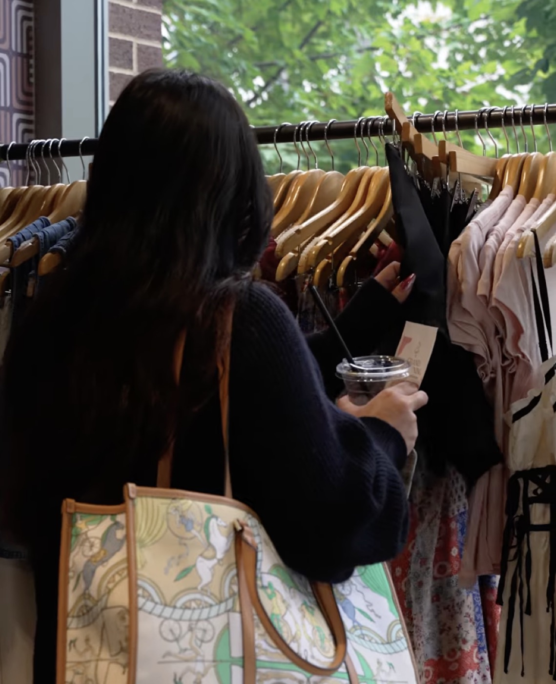 A customer browsing the rails at House Of